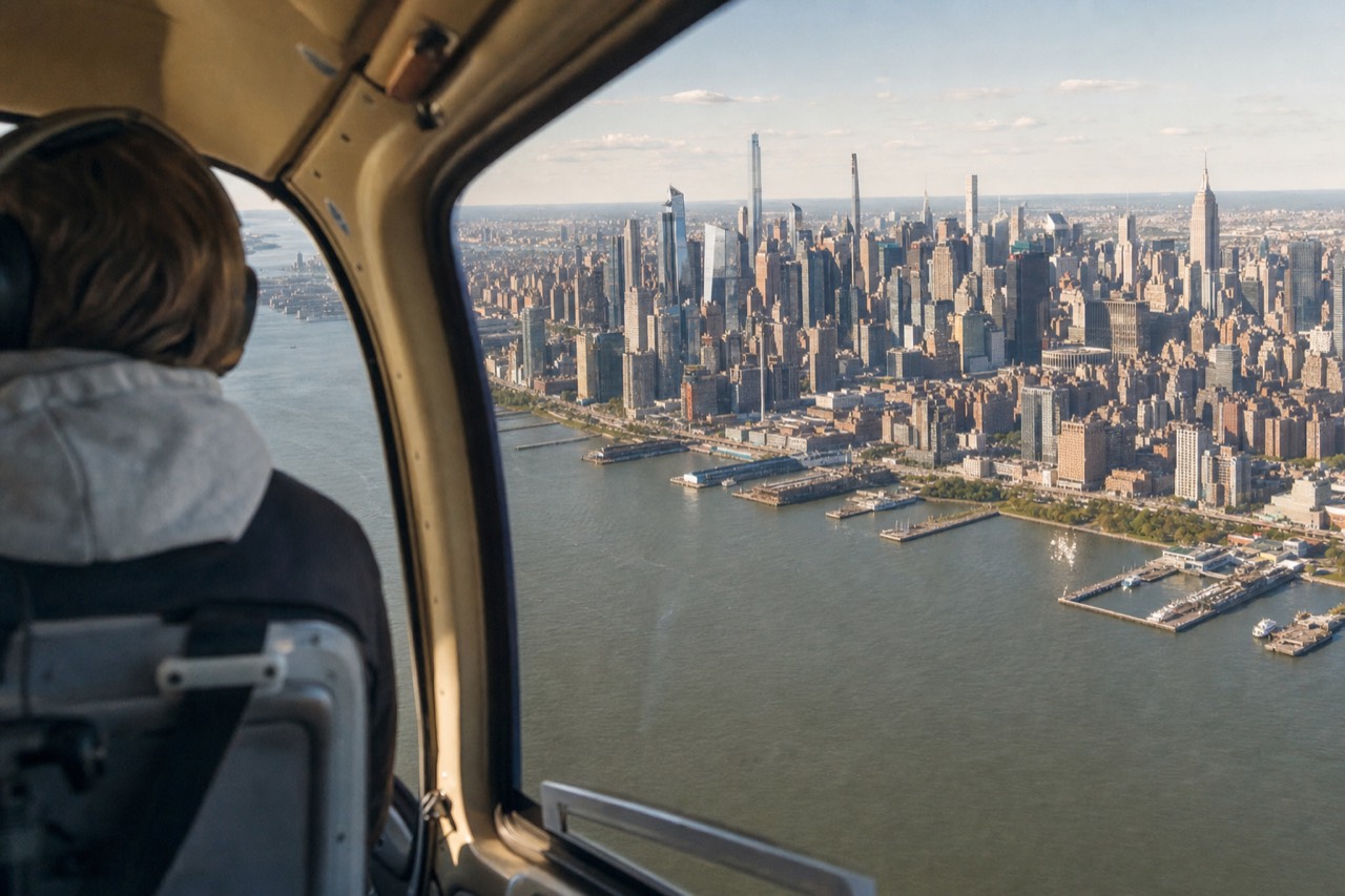 Manhattan skyline lit by sunset from the west on a helicopter tour